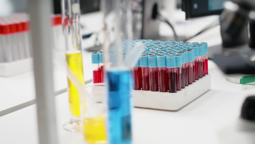 Tablet and PC in laboratory displays DNA visualization software used to process patient data for clinical research. Digital interface used for genetic analysis diagnostics in laboratory, jib down shot - Powered by Shutterstock - Get 15% off with code: PIKWIZARD15