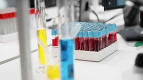 Tablet and PC in laboratory displays DNA visualization software used to process patient data for clinical research. Digital interface used for genetic analysis diagnostics in laboratory, jib down shot - Powered by Shutterstock - Get 15% off with code: PIKWIZARD15