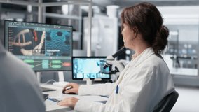 Clinical laboratory technologist writing observations from laboratory experiment for research documentation. Research facility expert doing note taking, preparing clinical reports, camera B - Powered by Shutterstock - Get 15% off with code: PIKWIZARD15