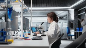 Exhausted laboratory scientist rubbing eyes, tired of evaluating genetic markers using PC. Weary expert fatigued by DNA strand mapping at computer desk, sighing, camera A - Powered by Shutterstock - Get 15% off with code: PIKWIZARD15