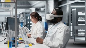 Scientist using computer and VR headset equipment for DNA data analysis in laboratory. African american man using bioinformatics genomics software and virtual reality tech in modern lab, camera B - Powered by Shutterstock - Get 15% off with code: PIKWIZARD15