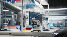 Computer monitor in biotechnology laboratory showing molecular model visualization and microscope on workbench. Bioengineering software on PC in medical lab displaying DNA data and optical device - Powered by Shutterstock - Get 15% off with code: PIKWIZARD15