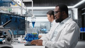 Stressed laboratory scientist using computer monitor, processing DNA patient data for clinical research. Anxious lab specialist looking at genetic analysis diagnostics on PC, camera A - Powered by Shutterstock - Get 15% off with code: PIKWIZARD15