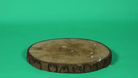 A person neatly stacks small cheese biscuit flakes on a wooden surface. Great for food preparation or snack concept visuals. - Powered by Shutterstock - Get 15% off with code: PIKWIZARD15