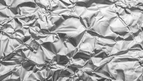 Shiny metal silver gray foil leaf crumpled texture background stop motion - Powered by Shutterstock - Get 15% off with code: PIKWIZARD15