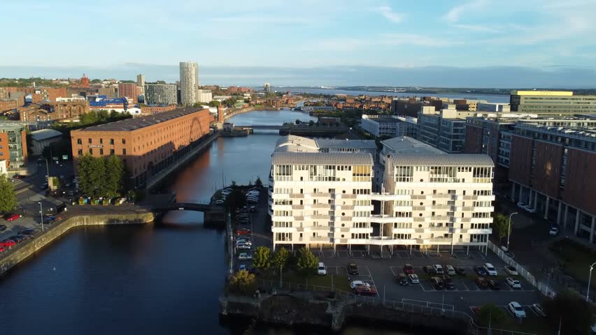 Aerial drone view of Liverpool, Northwest England, showcasing city skyline, waterfront, historic architecture, and urban landscape from above.