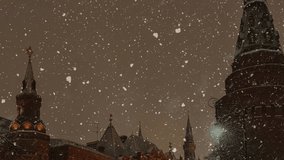 Winter cityscape snowfall covers city housing with snow in the night under the dark winter sky - Powered by Shutterstock - Get 15% off with code: PIKWIZARD15