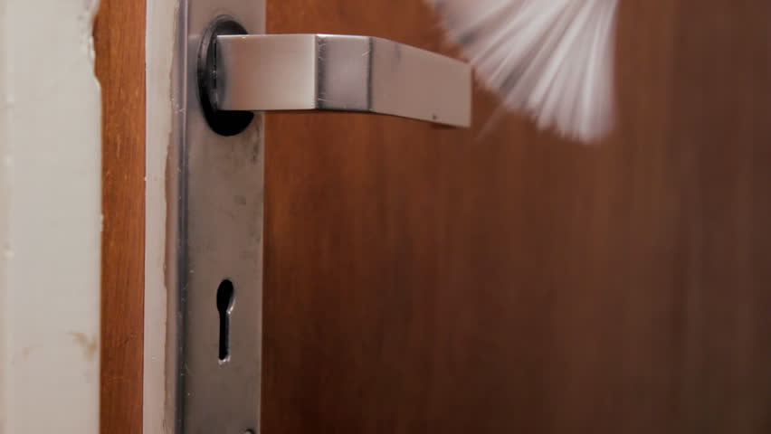 Police dust door handle for fingerprints
