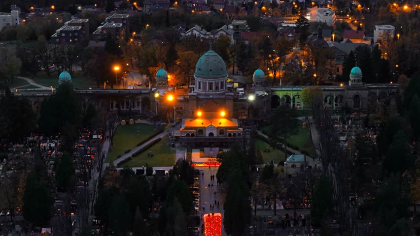 Aerial view of Mirogoj Cemetery reveals striking architecture and a path illuminated with candles, creating a scene of remembrance, Mirogoj Cemetery, Grad Zagreb, Croatia.