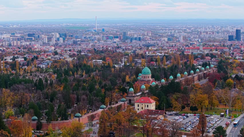 Aerial view of Mirogoj Cemetery showing the domes and architecture contrasting with the surrounding autumn colors, Mirogoj Cemetery, Grad Zagreb, Croatia.