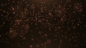 Abstract gold glitter particles swirl and fly against a beautiful, elegant background. Bokeh effect for celebrating holidays and awards. - Powered by Shutterstock - Get 15% off with code: PIKWIZARD15