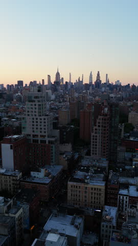 urban horizon with shadows, twilight city skyline featuring layered buildings and distant towers