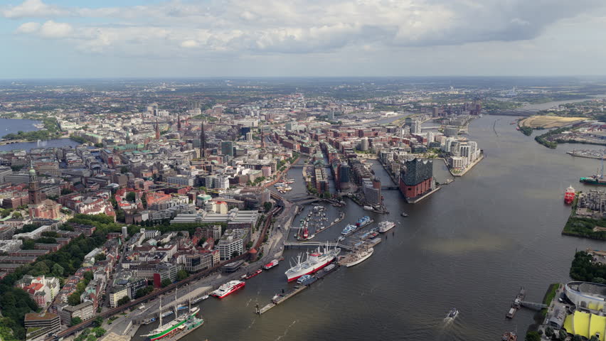 High altitude panoramic view flying over Hamburg, Germany of cityscape with the Elbe river, Speicherstadt und HafenCity