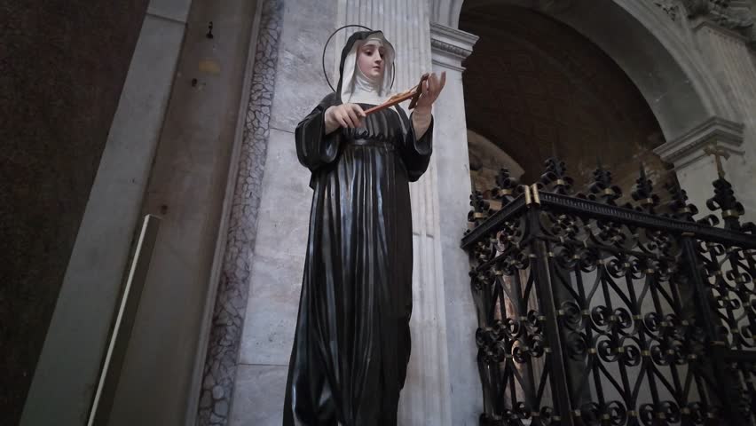 Old statue of Saint Rita of Cascia Patroness of Impossible Causes - Powered by Shutterstock - Get 15% off with code: PIKWIZARD15