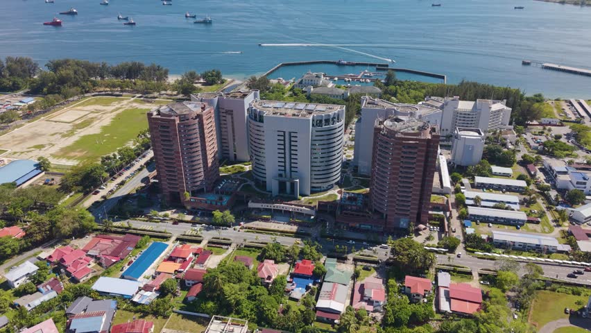 Aerial view of Labuan’s Victoria Financial Park, Malaysia. Modern towers, offices, and coastline scenery showcasing the island’s business and financial hub near the South China Sea.