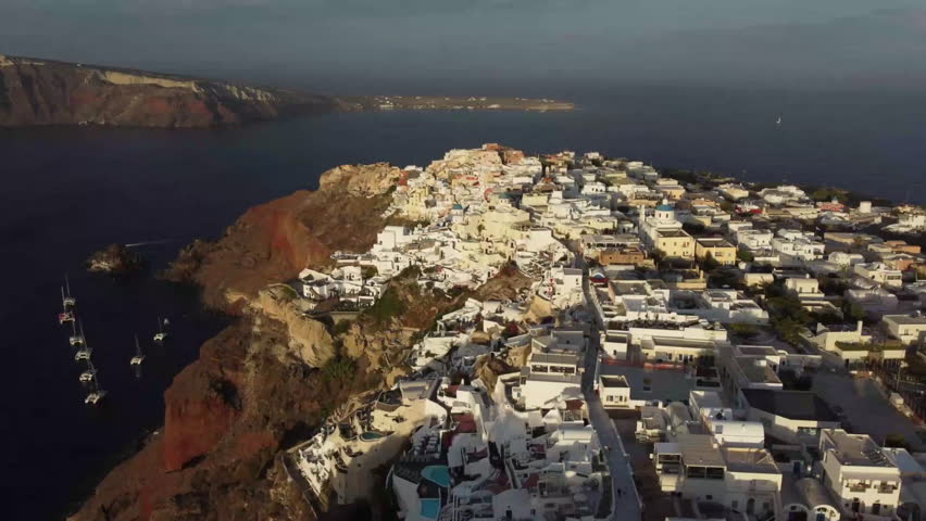 Aerial of buildings near beautiful sea.