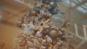 A beautifully decorated Christmas tree adorned with delicate snowflake ornaments. This festive decoration captures the magical and frosty spirit of a winter holiday. - Powered by Shutterstock - Get 15% off with code: PIKWIZARD15