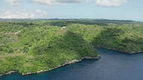 Stunning aerial drone view of Amok Sunset, a popular sunset point perched high on a cliff in Nusa Penida, Bali, Indonesia. - Powered by Shutterstock - Get 15% off with code: PIKWIZARD15