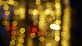Softly twinkling fairy lights blur into warm golden bokeh at night, creating festive abstract scene with cinematic light, gentle motion and ample copy space - Powered by Shutterstock - Get 15% off with code: PIKWIZARD15