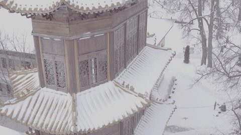 Snowy Traditional Chinese Wooden Temple Pavilion
