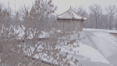 Drone View Snowy Chinese Pavilion through Winter