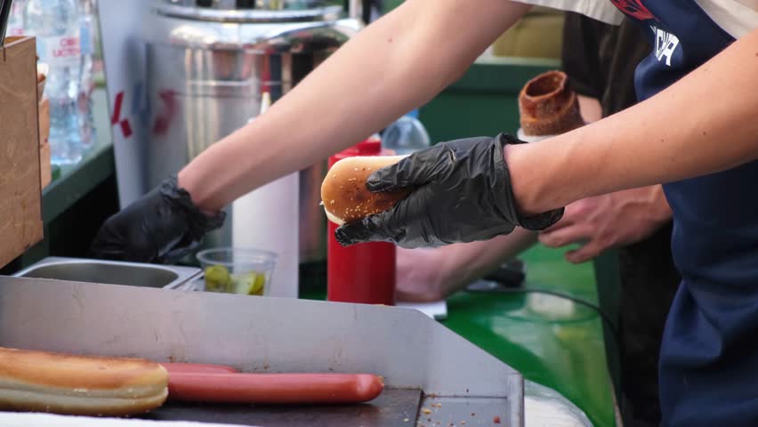 Close-up of street cafe worker