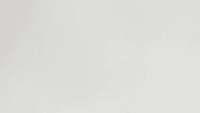 Close-up 4K Ultra HD footage of beige cream foundation being pumped onto a white surface, showing smooth cosmetic texture, skincare product consistency, and beauty makeup detail. - Powered by Shutterstock - Get 15% off with code: PIKWIZARD15