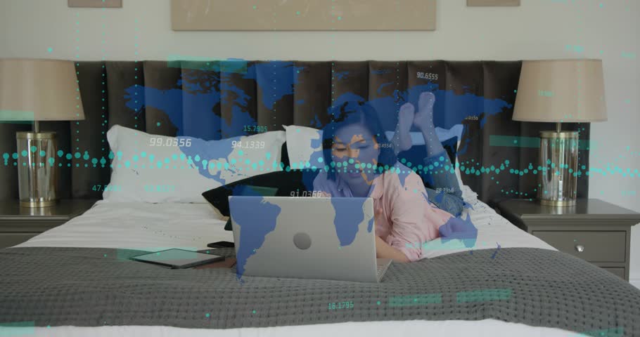 Woman lying on bed opening laptop and holding green device, animated data map rising for analysis. Technology, remote work, digital, communication, lifestyle, modern, productivity