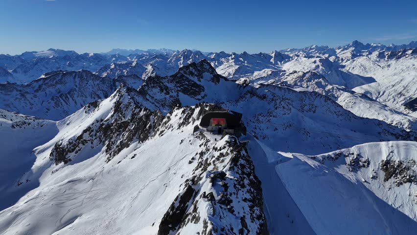 Andermatt Gemsstock Drone View at Ski Arena during Winter with the panorama over the Swiss Alps, Uri, Switzerland