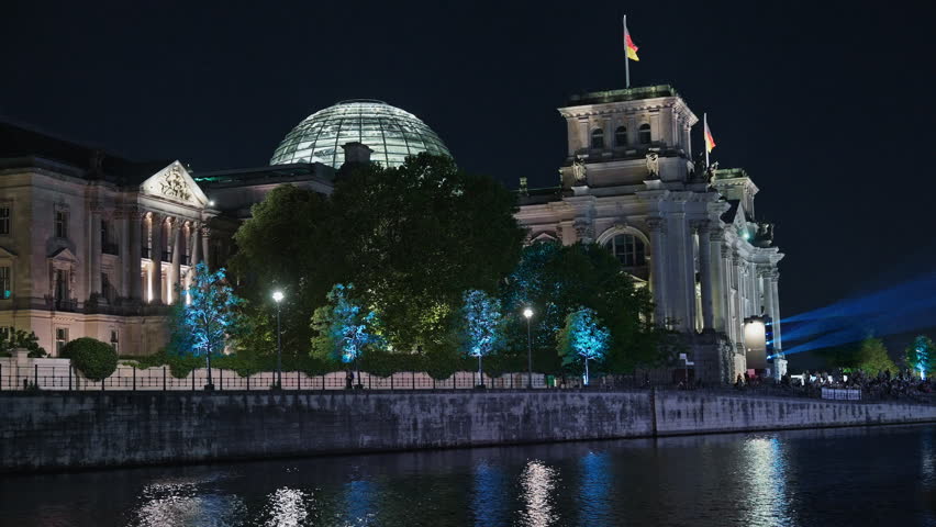 A view from the embankment of Berlin at night, overlooking famous architectural landmarks. Berlin,Germany