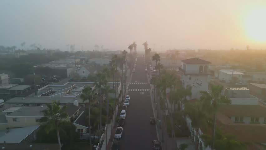 Scenic aerial drone view of Seal Beach California coastline with ocean water sandy beach and sky horizon in Orange County USA vacation and tourism concept