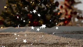 Snowy tabletop sending star confetti swirling upward as LEVEL UP text emerging showing holiday joy. Festive, celebration, sparkle, glow, fireplace, cozy, illumination - Powered by Shutterstock - Get 15% off with code: PIKWIZARD15