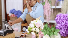 Senior woman, florist small business owner, digital skill, manages inventory on laptop, confident with technology in retail operations, bookkeeping tasks, remote access to financial control and supply - Powered by Shutterstock - Get 15% off with code: PIKWIZARD15