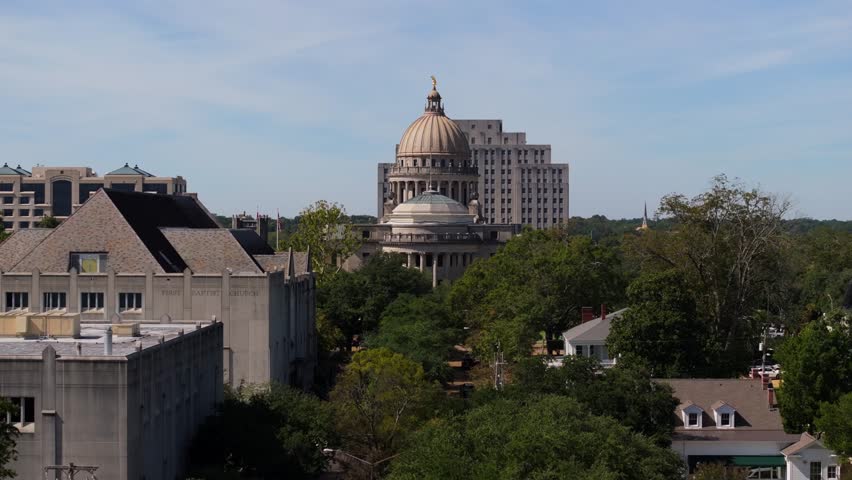 Aerial Boom Shot Reveals Mississippi State Capitol Building on Summer Day