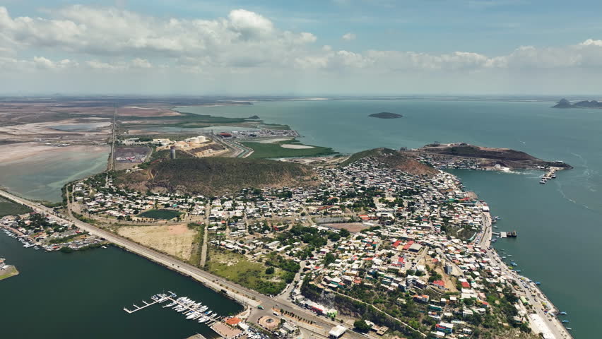 Aerial view backwards over the Topolobampo town, sunny day in Sinaloa, Mexico