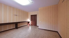 Spacious empty room with warm striped wallpaper, tiled floor, and a long built-in bench. Perfect for renovation or new design - Powered by Shutterstock - Get 15% off with code: PIKWIZARD15