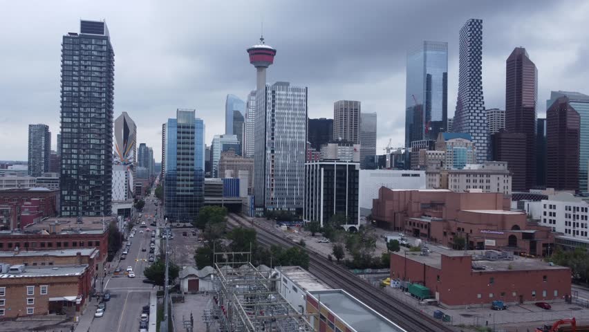 Calgary City Downtown aerial drone cloudy pan