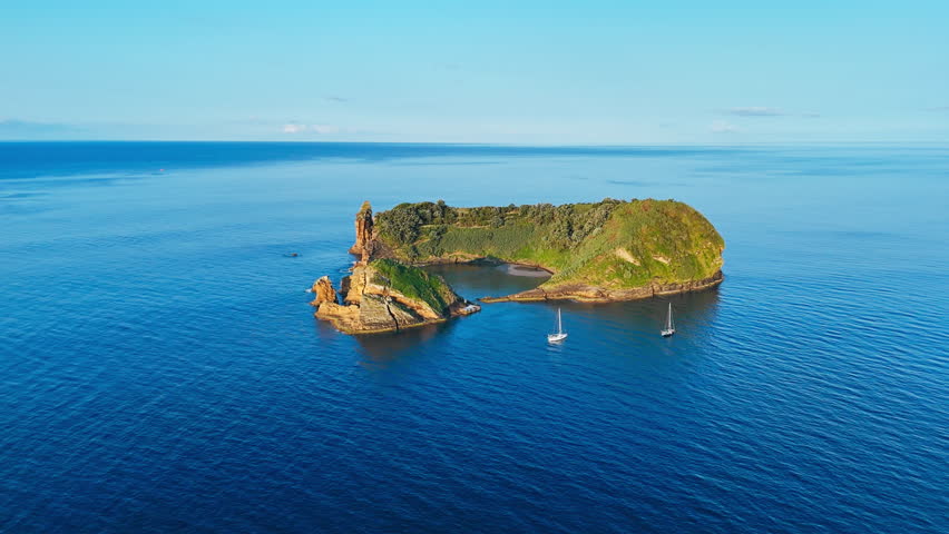 Drone footage of Vila Franca Islet with crater lagoon in Atlantic ocean, Azores island