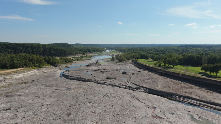 Rocky riverbed upstream from Pensacola Dam, downcutting channel in Oklahoma rocks, aerial