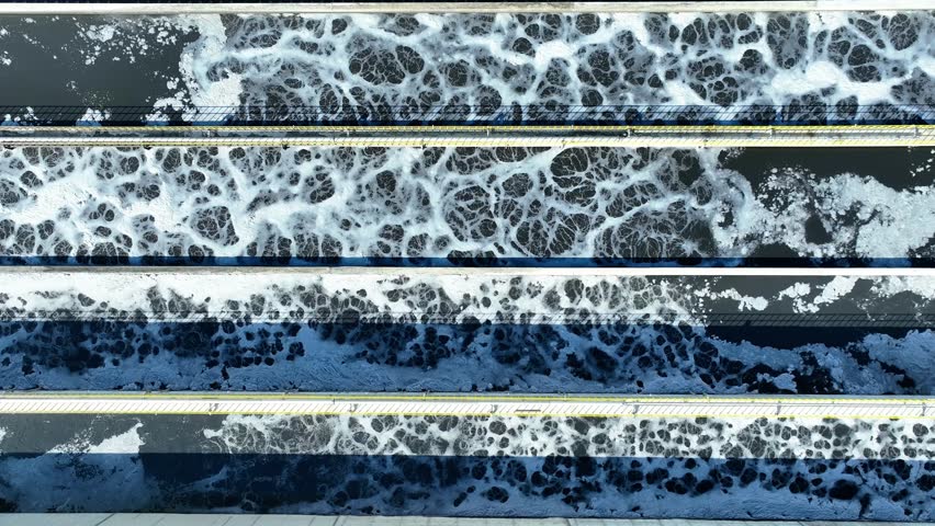 Wastewater treatment plant aeration basins, industrial water treatment process, environmental engineering infrastructure