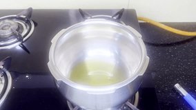 Hand displays colorful spices on steel plate in kitchen, Lady selects seasonings for homemade traditional dish, Aromatic herb prepare to be mixed into boiling pot, Vessel Holds Key Mix Ins inside Meal - Powered by Shutterstock - Get 15% off with code: PIKWIZARD15