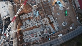 Drone flyover image of an active construction site in Germany, showing urban development, modern housing needs, and the construction sector’s economic role in both Germany and the European Union. - Powered by Shutterstock - Get 15% off with code: PIKWIZARD15