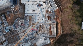 Drone flyover image of an active construction site in Germany, showing urban development, modern housing needs, and the construction sector’s economic role in both Germany and the European Union. - Powered by Shutterstock - Get 15% off with code: PIKWIZARD15