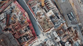 A straight-down aerial shot of a major construction site in Hamburg, Germany, highlighting the scale of building activity, engineering, and urban development within the European Union. - Powered by Shutterstock - Get 15% off with code: PIKWIZARD15