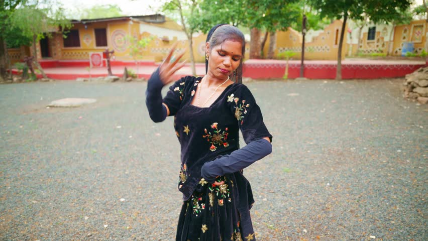 Veiled Female Artist Sings and Twirls at Cultural Fair, Traditional Lady Folk Dance in Vibrant Festive village, Ethnic dancer croons plus sways by rural fest, Heritage Ceremony with Carnival Melodies