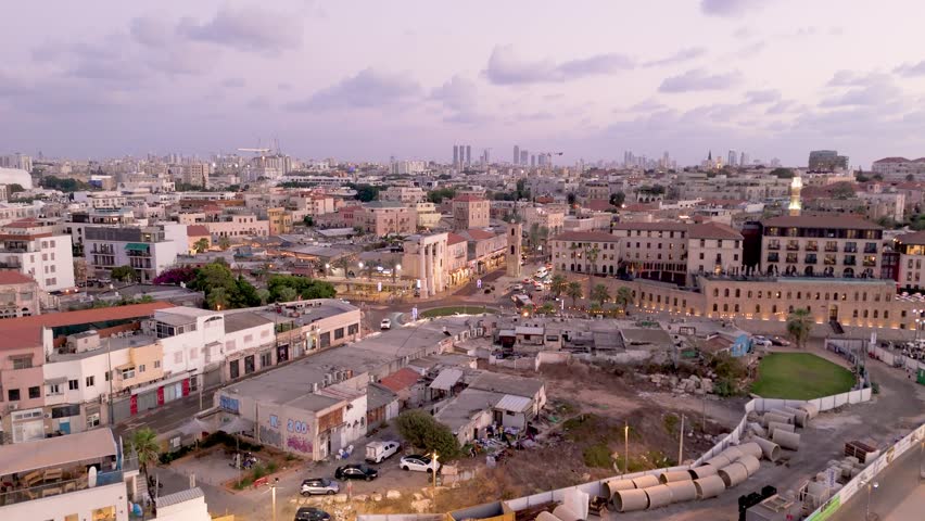 Aerial view of the cityscape in Old Jaffa reveals the blend of historic architecture and modern urban life, Tel Aviv-Yafo, Israel.