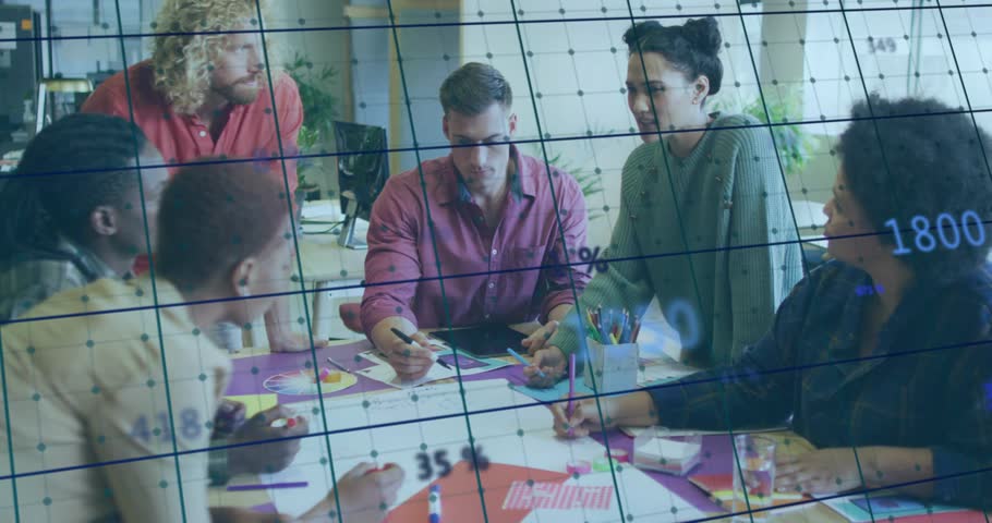 Group gathering at table after speaker gesturing at swatch, adding grid overlays for design review. Collaboration, teamwork, planning, brainstorming, creative, communication, workspace