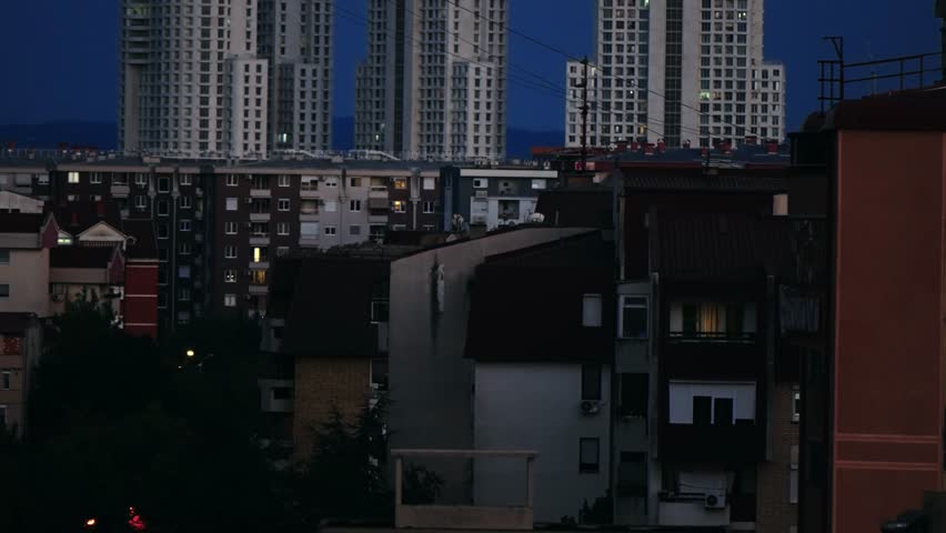 Modern skyscrapers aerial panorama in Skopje against a twilight sky with urban buildings