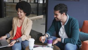 Colleagues tapping trackpad, monitoring social media with animated follower counts multiplying. Collaboration, technology, digital, networking, communication, teamwork, modern - Powered by Shutterstock - Get 15% off with code: PIKWIZARD15