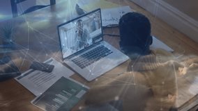 Man opening laptop joining business meeting reviewing charts and taking notes with digital overlays. Collaboration, communication, digital, workspace, productivity, connection, analysis - Powered by Shutterstock - Get 15% off with code: PIKWIZARD15